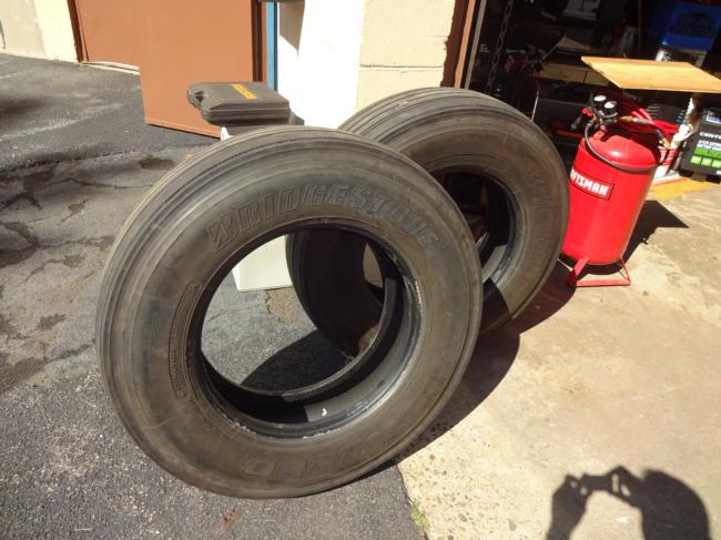 TWO EXCELLENT CONDITION BRIDGESTONE RADIAL STEER TIRES   OR SPARES
295  75  R 22.5
BOTH CAME NEW AS STEERING TIRES ON MY VOLVO TRACTOR WHEN ONE TIRE WENT FLAT I REMOVED BOTH AND REPAIRED FLAT WITH PRO CENTECH PATCH AS SEEN. THE OTHER TIRE IS FINE.
WHEN REMOVED THEY HAD ABOUT46000 MILES. 
